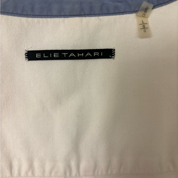 A light airy white comfortable button down top that is worth the wear - Picture 3 of 3